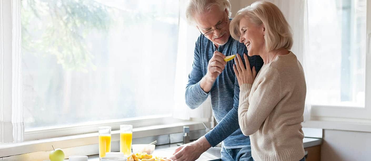 caring-husband-feeding-wife